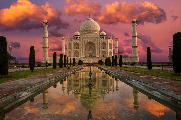 The Taj Mahal, built by Shah Jahan in 1632, symbolizes eternal love and Mughal architecture, made of white marble.